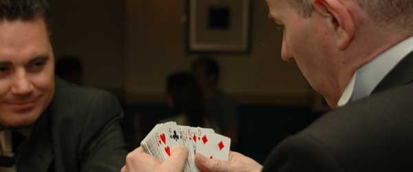 wedding magician with fanned cards