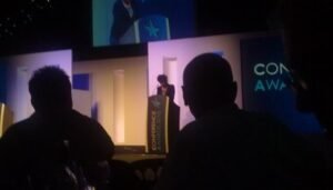 Conference Magician watches Ruby Wax at work
